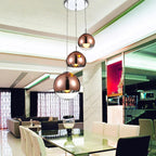 Suspension globe en verre LumaOrb, finitions argent, or et or rose
