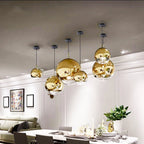 Suspension globe en verre LumaOrb, finitions argent, or et or rose