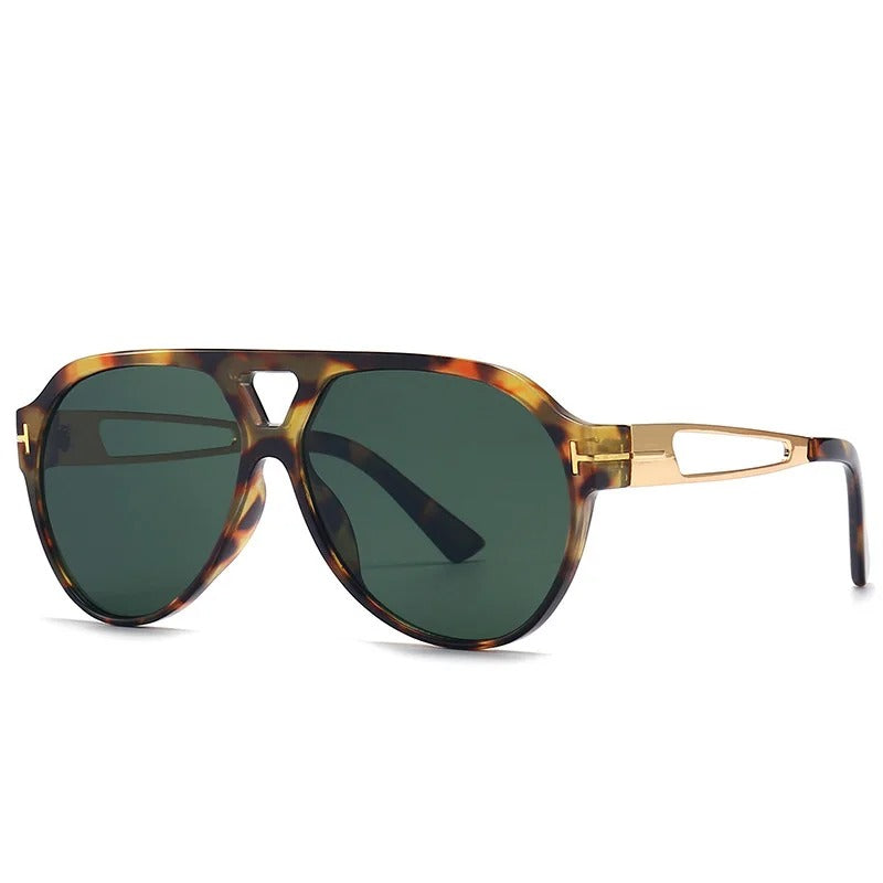 Kirella Aviator-solbriller med gulddetaljer og UV-beskyttende linser