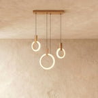 Aurora Loop Chandelier With Acrylic Ring Heads And Wooden Base