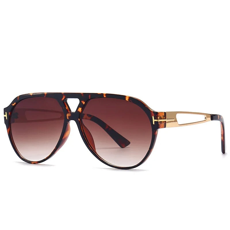 Kirella Aviator-solbriller med gulddetaljer og UV-beskyttende linser