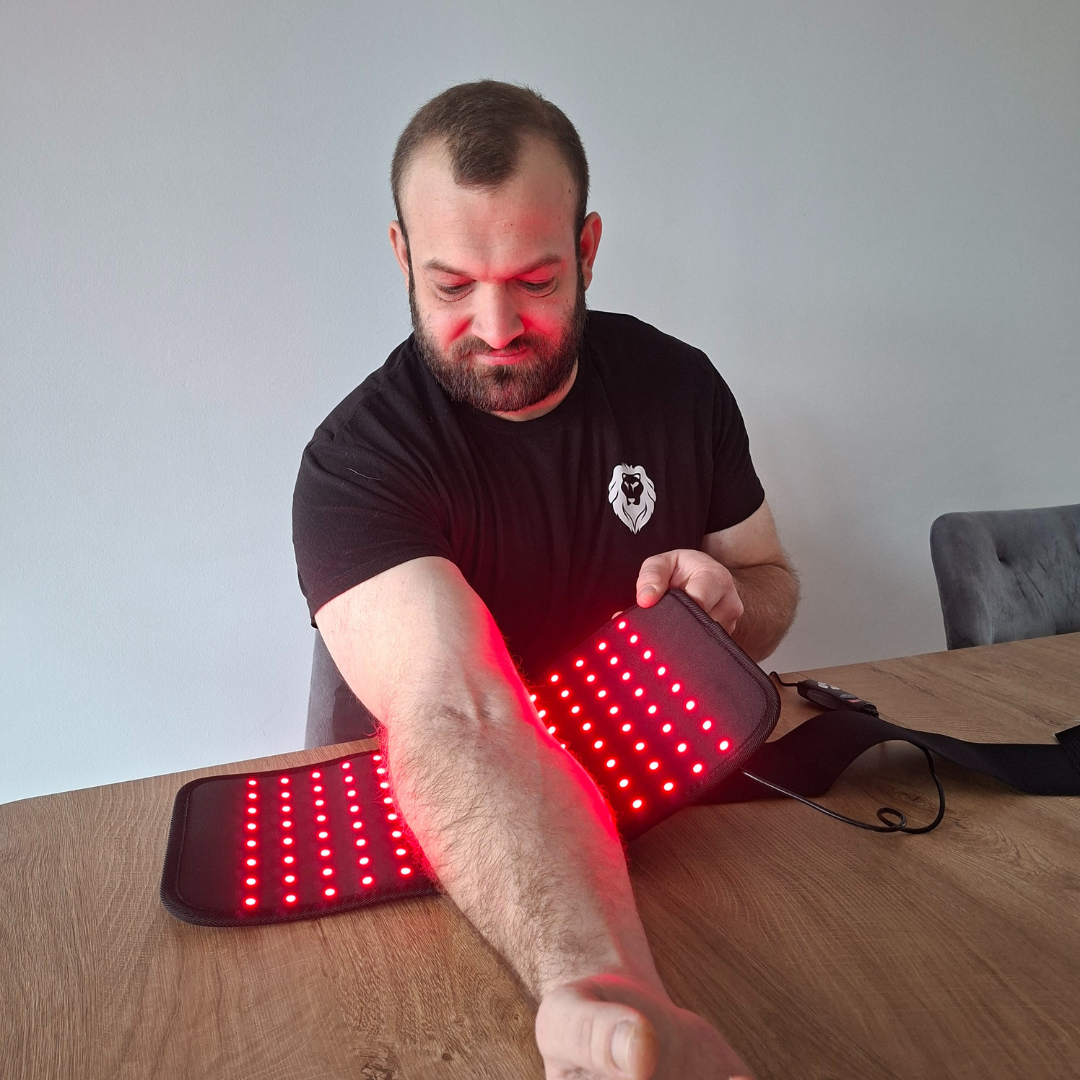 Ellebooggewrichtsondersteuning met rood en nabij-infraroodlichtpad