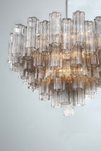 Lampadario Murano in vetro a tubi stratificati ambra Lustra | Fioriscas