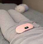 Sladdlös värmedyna för mensvärk med vibration och tre temperaturinställningar | Fioriscas