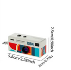 Câmara retro de porta-chaves 1080P com sensor CCD, flash integrado e suporte para MicroSD de 128GB | Fioriscas