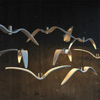 Hanglamp van hars met vogelsilhouet en warm of wit licht