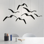 Hanglamp van hars met vogelsilhouet en warm of wit licht
