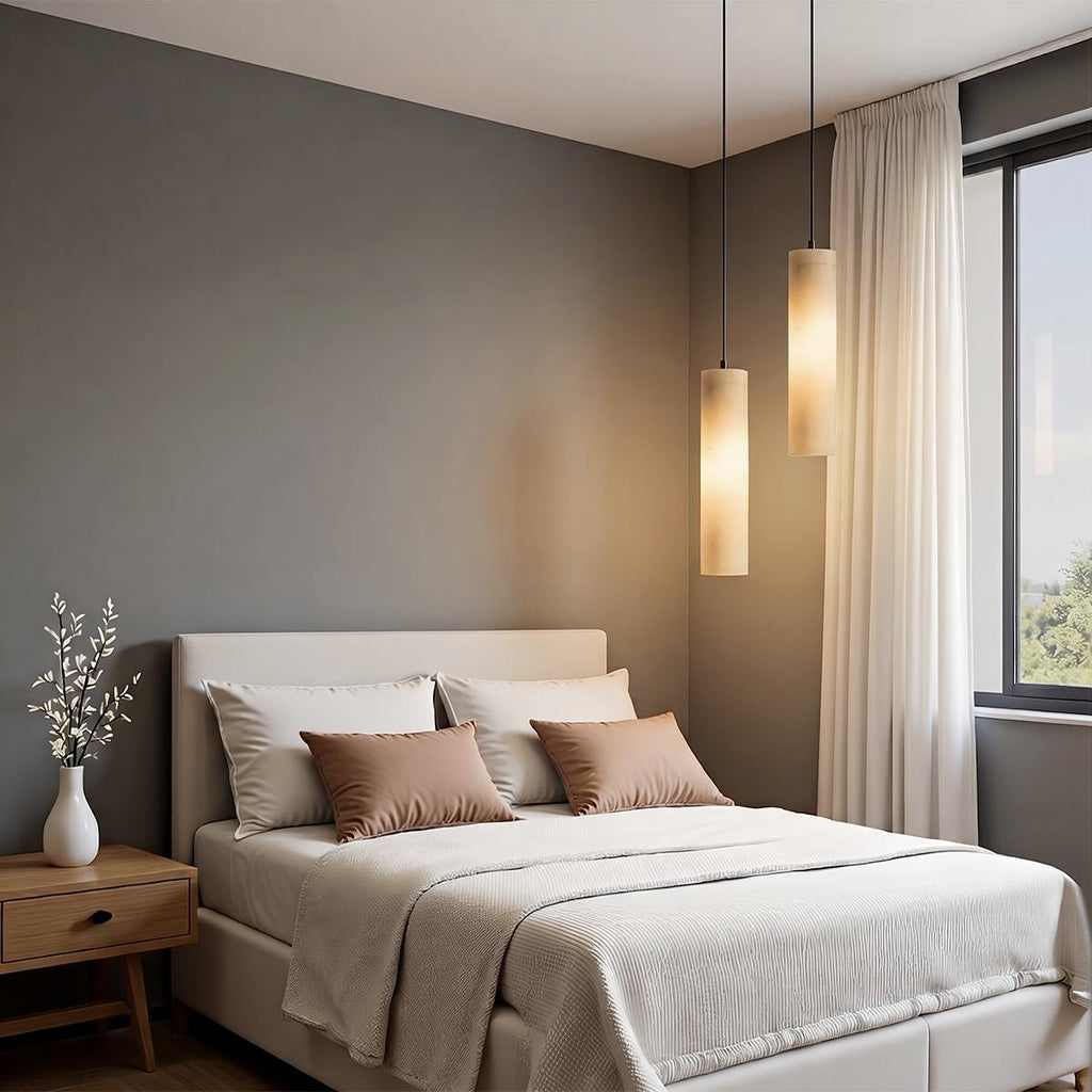 Lampadario a sospensione moderno con cilindri in alabastro e luce soffusa