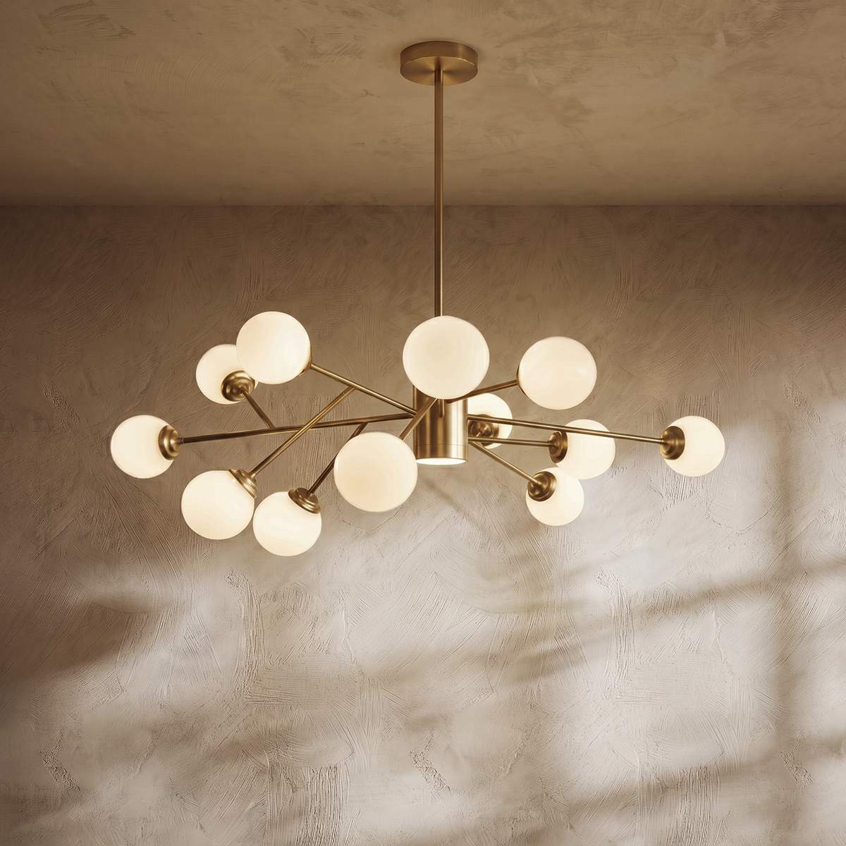 Arcadia Luxe ljuskrona i guld- eller svart aluminiumfinish för mysig atmosfär