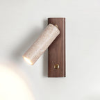 Applique murale cylindrique en travertin avec spot Ornoria | Fioriscas