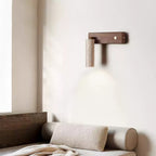 Applique murale cylindrique en travertin avec spot Ornoria | Fioriscas