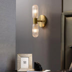 Evania Messing- und strukturiertes Glas Doppel-Wandleuchte | Fioriscas