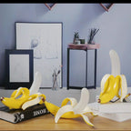 Finurlig bananbordlampe i varmtonet resin, BananaShine
