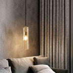 Lampa wisząca Aura Crystal w kształcie cylindra z żelaza i mosiądzu