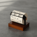 Mid-Century wooden rotary calendar for tasteful desk design - Fioriscas