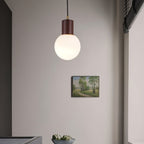 Lámpara colgante LumaWood Orb con soporte de madera para interiores escandinavos modernos