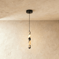 LumenStone Marble Pendant Light Elegant Stone Column Fixture for Modern Interiors