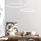 Lustr Aurora Circle s jemným halo osvětlením nad jídelním stolem
