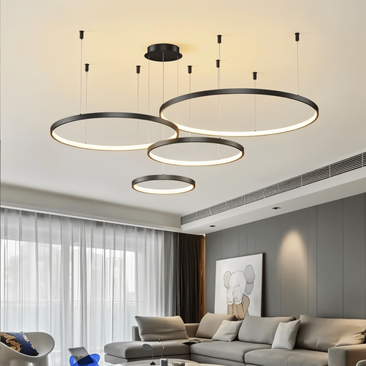 Lustr Aurora Circle s jemným halo osvětlením nad jídelním stolem