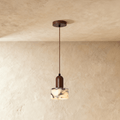 Stone And Wood Pendant Light With Warm Minimal Glow