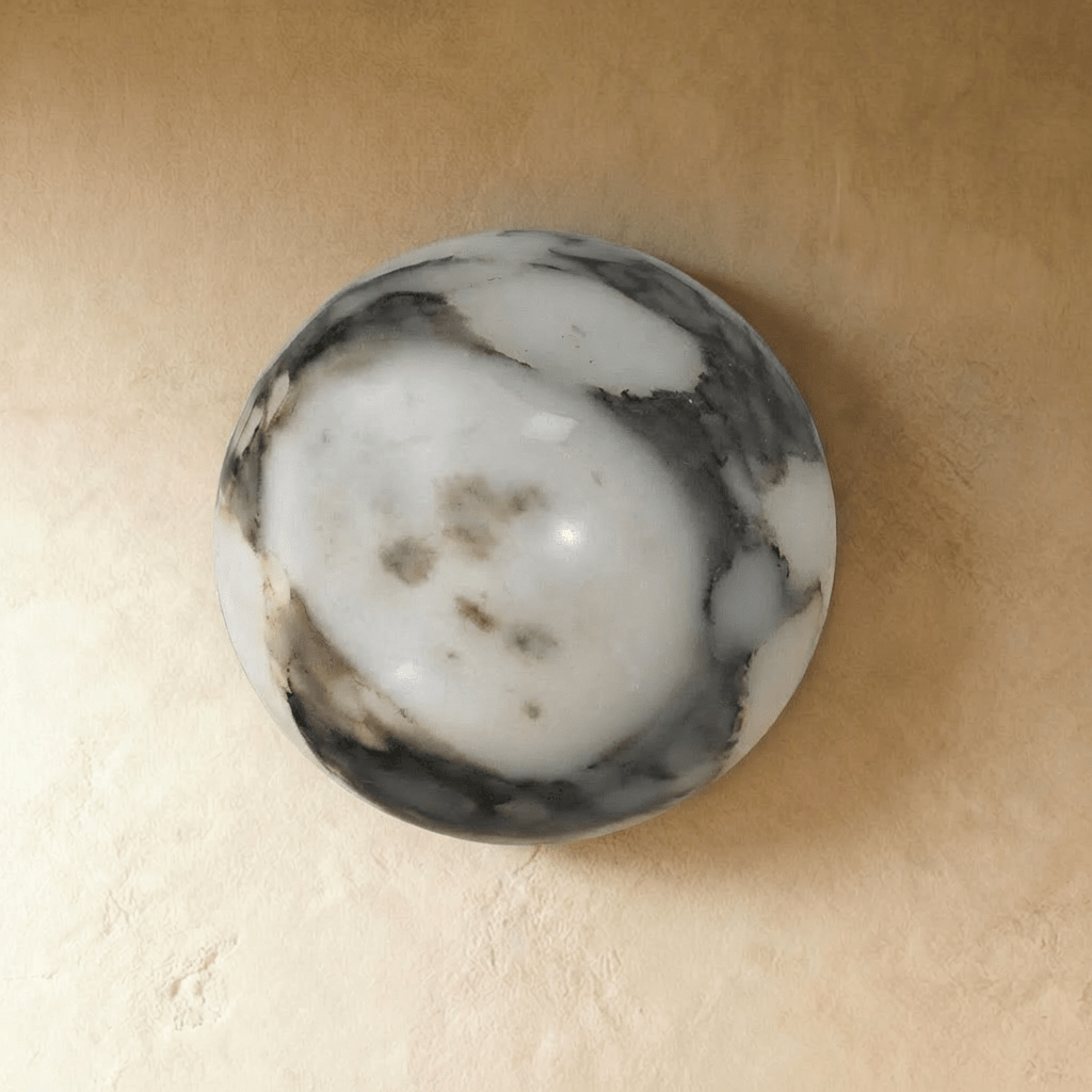 Lámpara de pared Stone Sphere Glow con luz interior cálida de mármol