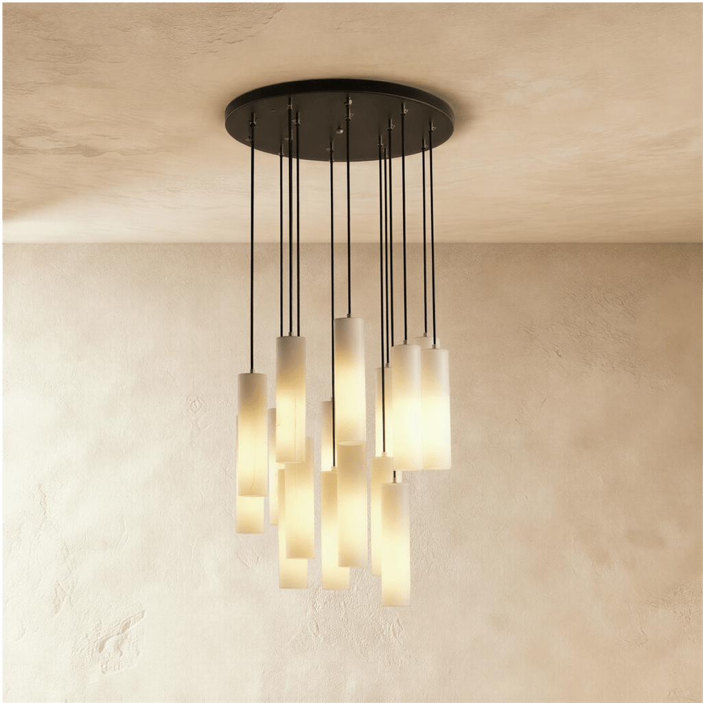 Lampadario a sospensione moderno con cilindri in alabastro e luce soffusa
