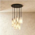 Lampadario a sospensione moderno con cilindri in alabastro e luce soffusa