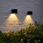 SolaraGlow solarna lampa ścienna zewnętrzna z ciepłym ambientowym światłem