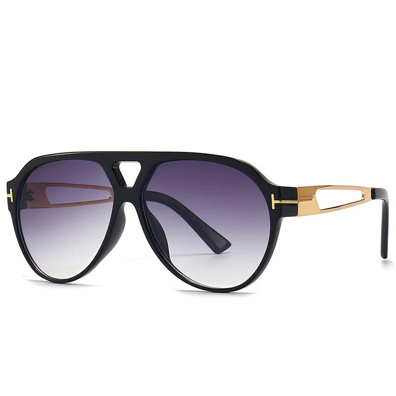 Kirella Aviator-solbriller med gulddetaljer og UV-beskyttende linser
