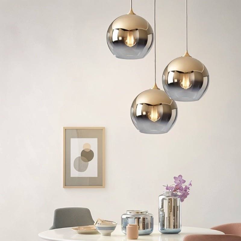 Aurora glaspendel med ombré-finish i champagne, silver och roséguld