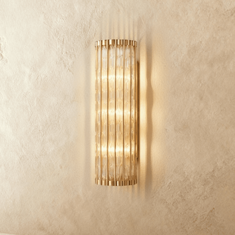 Copper Cascade Wall Sconce With Glass Cylinder Shade And Ambient Glow