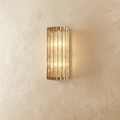 Copper Cascade Wall Sconce With Glass Cylinder Shade And Ambient Glow