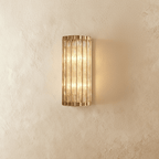 Copper Cascade Wall Sconce With Glass Cylinder Shade And Ambient Glow
