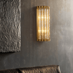 Copper Cascade Wall Sconce With Glass Cylinder Shade And Ambient Glow