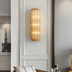 Copper Cascade Wall Sconce With Glass Cylinder Shade And Ambient Glow