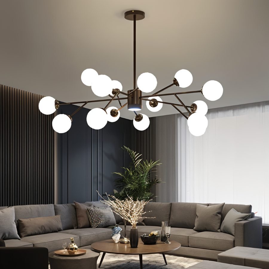 Arcadia Luxe ljuskrona i guld- eller svart aluminiumfinish för mysig atmosfär