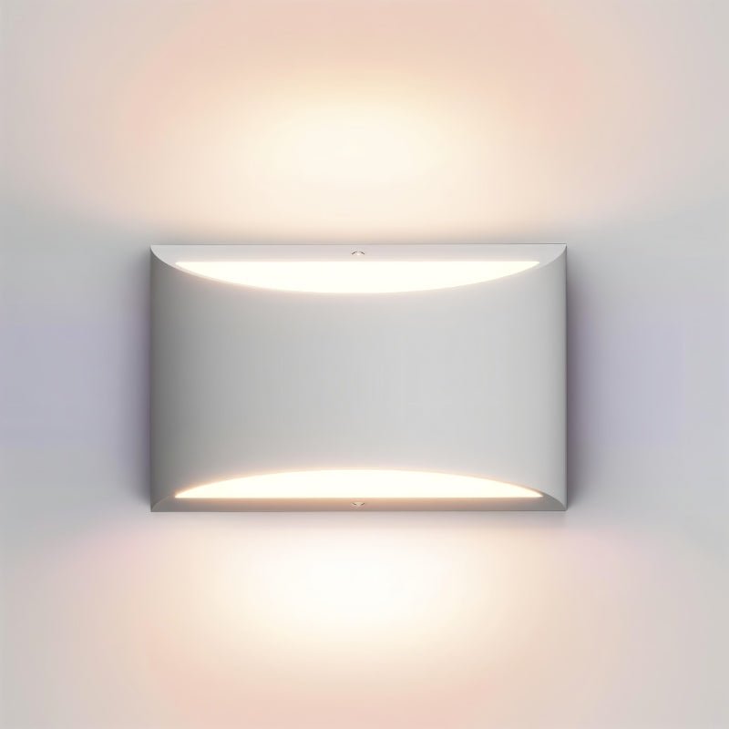 Lampada da parete AuroraCurve in gesso con luce soffusa verso l'alto e verso il basso