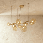 LumaOrbis orb-ljuskrona med LED-glasbollar på metallring