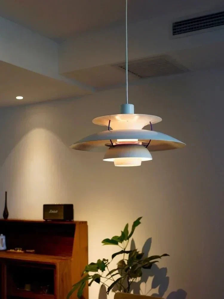 Lampada a sospensione Nexio, profilo cilindrico in metallo spazzolato