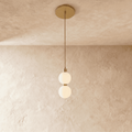 Aurora Cascade Acrylic Ball Pendant Light With Metal Accents
