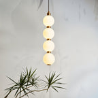 Aurora Cascade Acrylic Ball Pendant Light With Metal Accents