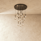 AquaLume regendruppel glazen kroonluchter met onderwatergloed en metalen frame