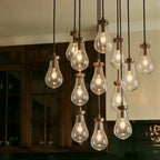 AquaLume regendruppel glazen kroonluchter met onderwatergloed en metalen frame