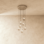 AquaLume regendruppel glazen kroonluchter met onderwatergloed en metalen frame