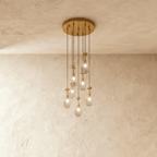 AquaLume regendruppel glazen kroonluchter met onderwatergloed en metalen frame