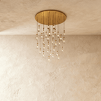 AquaLume regendruppel glazen kroonluchter met onderwatergloed en metalen frame