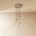 AquaLume regendruppel glazen kroonluchter met onderwatergloed en metalen frame