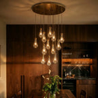AquaLume regendruppel glazen kroonluchter met onderwatergloed en metalen frame