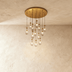 AquaLume regendruppel glazen kroonluchter met onderwatergloed en metalen frame