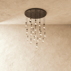 AquaLume regendruppel glazen kroonluchter met onderwatergloed en metalen frame